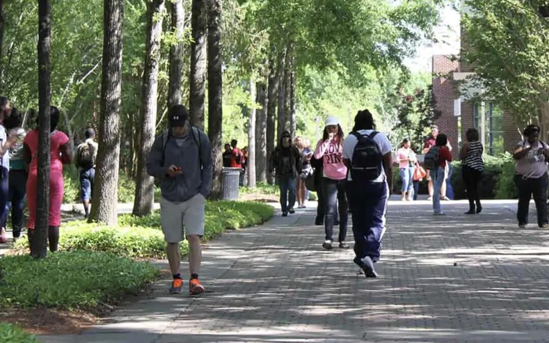 students walking brick path 1920x1080